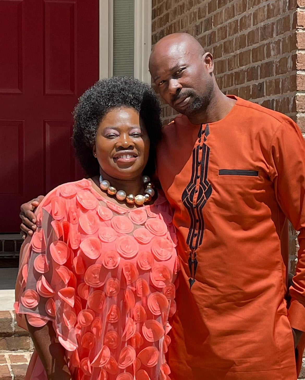 African Orange traditional suite with black embroidery Carl-Winston