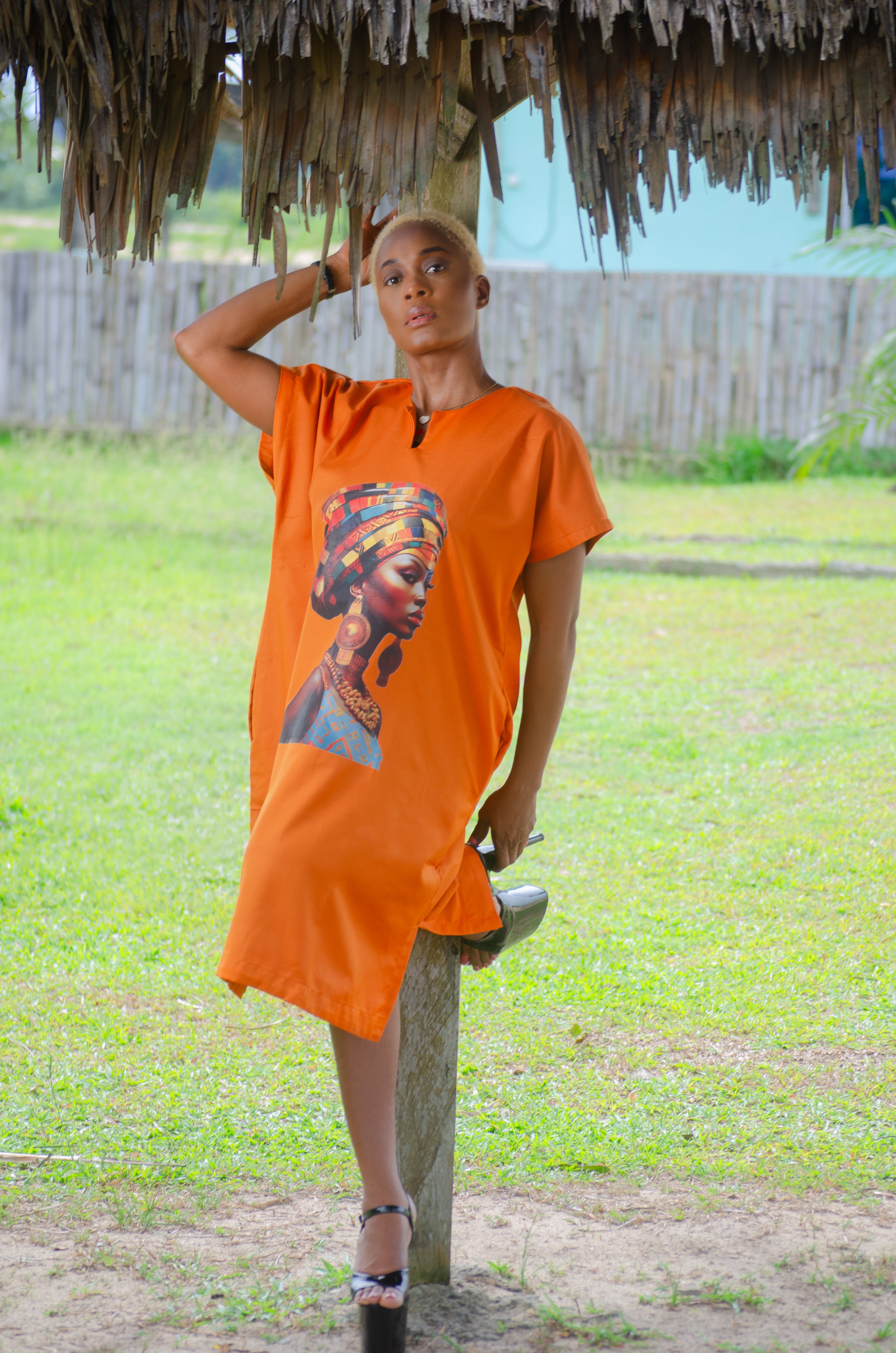 Soft breathable orange dress with African woman graphic with pockets Carl-Winston