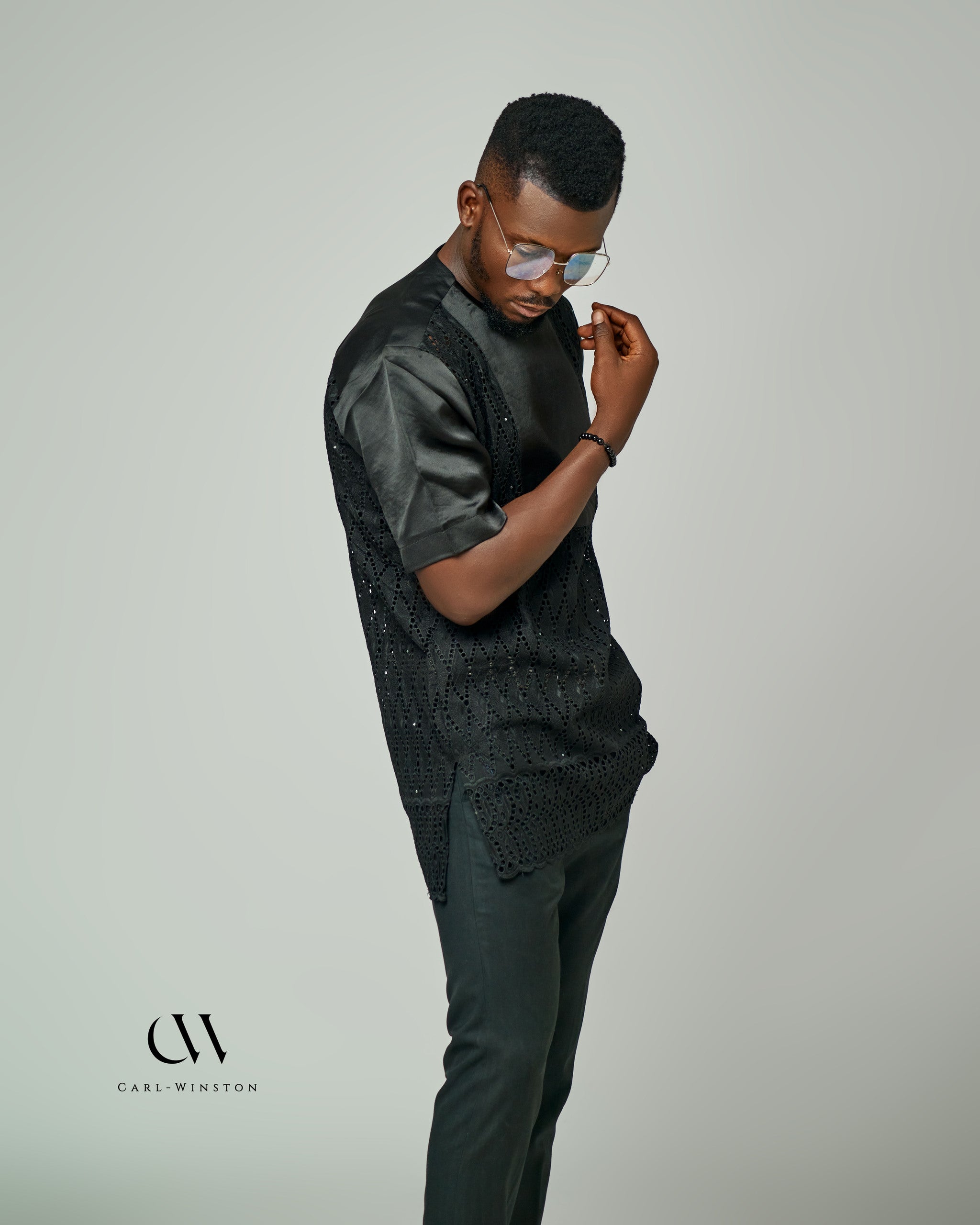 Close-up of the detailed lace texture of the Midnight Lace Elegance Shirt, showcasing the intricate craftsmanship of Carl-Winston’s luxury menswear collection.